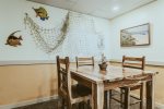 High top table with seating for 4 in the bonus roon, great for card games or some wine tasting
